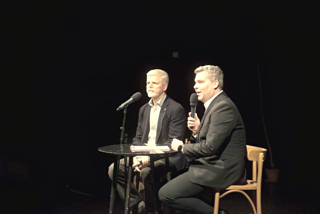 Ondra Vodný interviewing Czech President Petr Pavel on stage